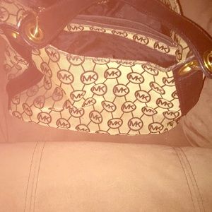 Mk purses and Fitbit watch watch comes with face cover and extra bands and chef